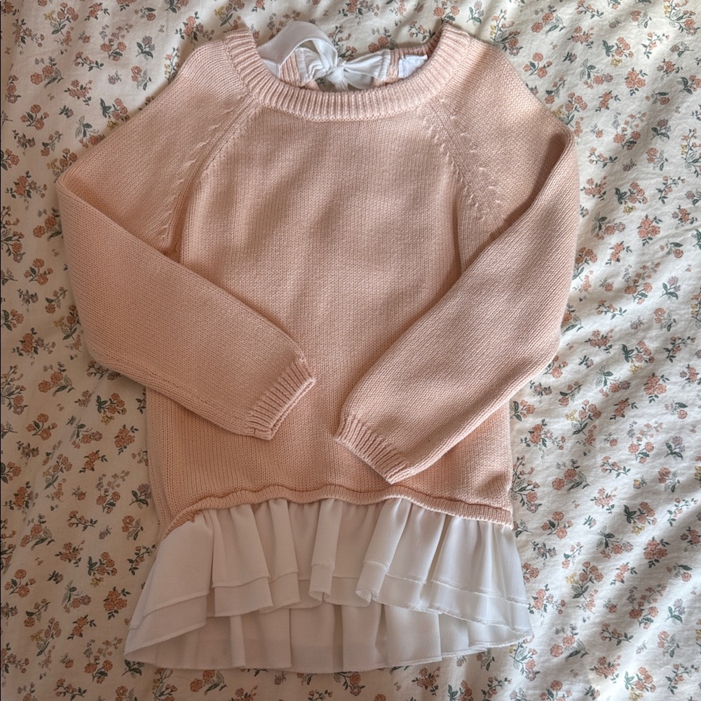 Elegant Pink Sweater with Ruffle Hem